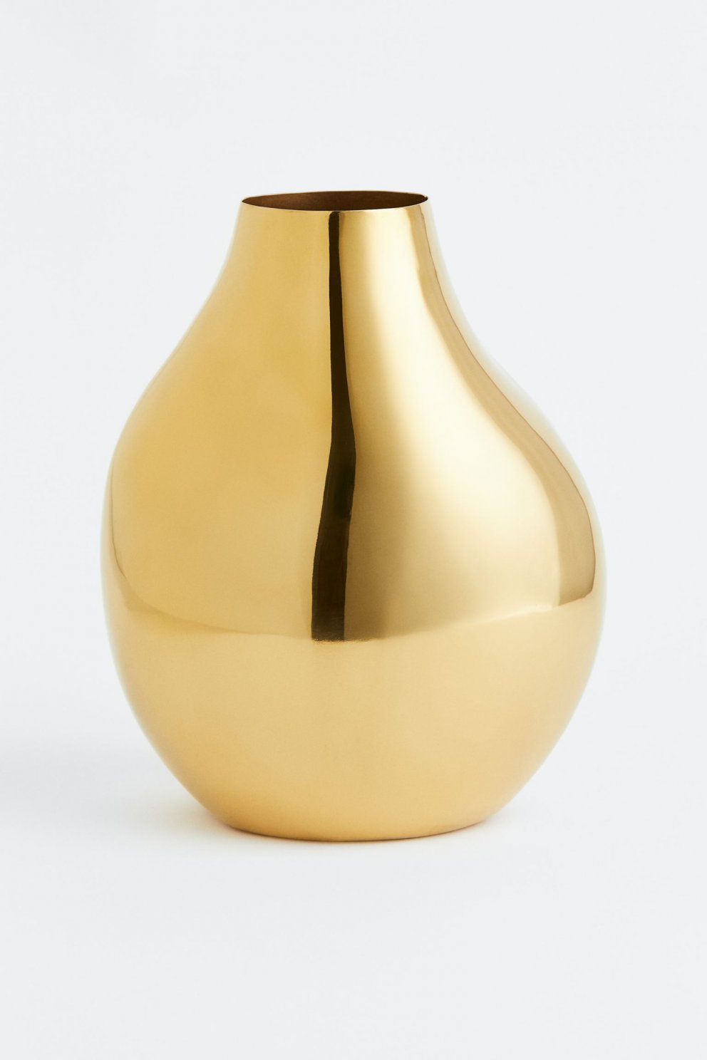 Gylltur vasi úr H&M Home.