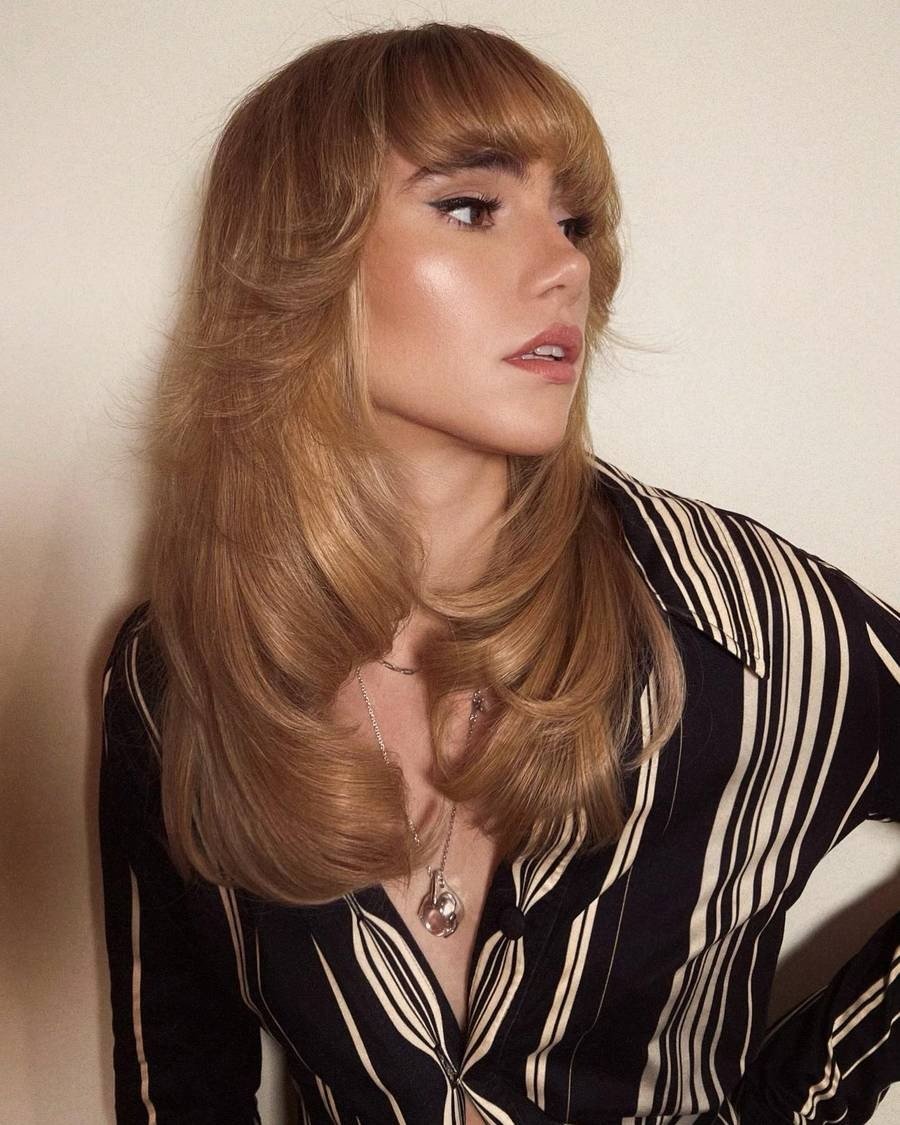 Hversu gordjöss er Suki Waterhouse? Stytturnar koma vel út í síðu hárinu og við elskum 70´s stíliseringuna.